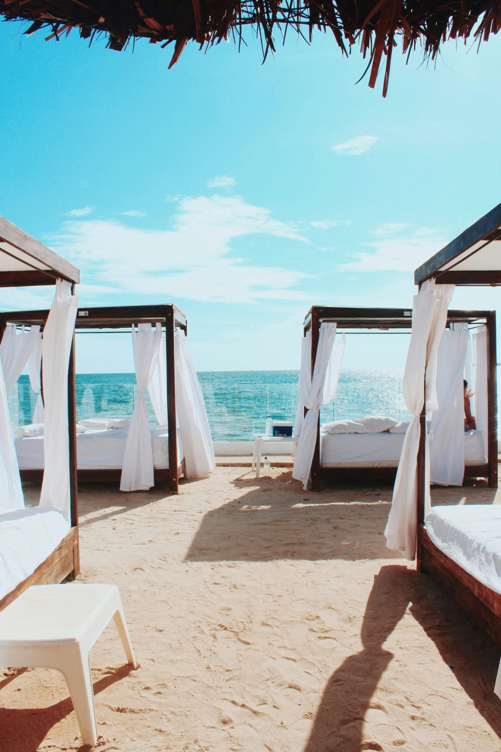 Beach club daybeds facing the sea