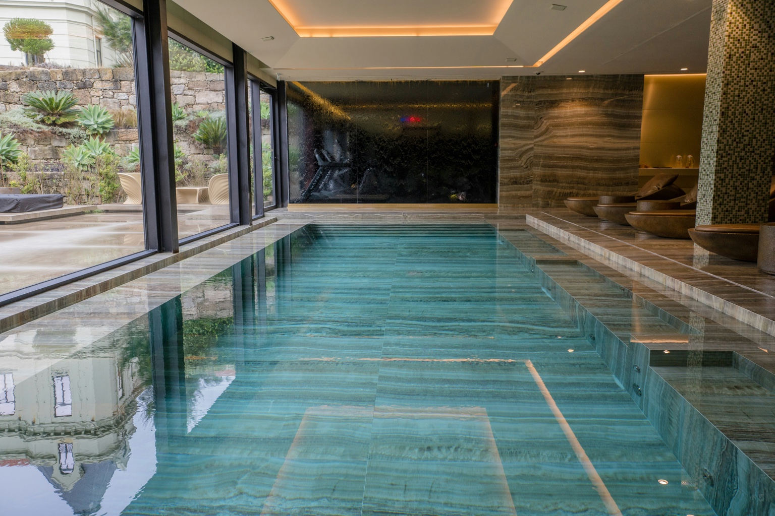 Luxury spa pool with natural stone interior